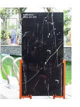 Gạch ốp 60x120 mặt tiền đen vân trắng