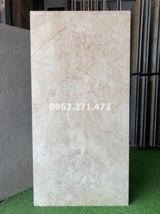 Gạch lát phòng khách vân đá vàng kem 60x120 Trung Quốc