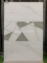 Đá bóng kiếng ốp tường phòng khách 30x60 Mikado